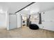 Spacious basement featuring carpet floors, a laundry area, and a security safe for added convenience and peace of mind at 3902 S Uravan St, Aurora, CO 80013