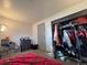 Bedroom featuring an open closet and carpet floors at 3902 S Uravan St, Aurora, CO 80013