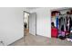 Bedroom with neutral walls, closet, and doorway, offering a blank canvas for personalization at 3902 S Uravan St, Aurora, CO 80013