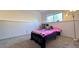 Carpeted bedroom featuring a large window and furnishings at 3902 S Uravan St, Aurora, CO 80013