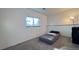 Bedroom with carpet flooring, a window, and a day bed at 3902 S Uravan St, Aurora, CO 80013