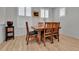 Dining room with wood table, chairs, and natural light at 1086 Highlands Dr, Erie, CO 80516
