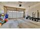 Spacious two-car garage with an automatic door and ample storage space at 1086 Highlands Dr, Erie, CO 80516