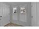 Hallway featuring natural light and wood-style floors at 1086 Highlands Dr, Erie, CO 80516