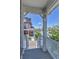 View from the porch showing neighborhood homes and blue skies at 1086 Highlands Dr, Erie, CO 80516