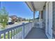 View from a covered porch overlooking a quiet street at 1086 Highlands Dr, Erie, CO 80516