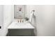Stylish bathroom with a marble countertop, modern fixtures, and elegant decor at 7308 S Steele Cir, Centennial, CO 80122
