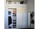 Well-organized bedroom closet featuring built-in shelves and hanging space behind sliding doors at 7440 S Blackhawk St # 2-106, Englewood, CO 80112