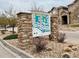 Community map on stone pillars, displaying building locations and amenities within the neighborhood at 7440 S Blackhawk St # 2-106, Englewood, CO 80112