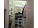 Walk-in closet with custom shelving for shoes, clothing, and accessories, maximizing storage space at 7440 S Blackhawk St # 2-106, Englewood, CO 80112