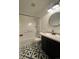 Clean bathroom with updated vanity and black accents at 269 Ponderosa Pl, Fort Lupton, CO 80621