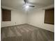 Bright bedroom with ceiling fan and neutral carpeting at 269 Ponderosa Pl, Fort Lupton, CO 80621