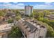 Aerial view of modern townhomes in a desirable location near mature trees and neighborhood amenities at 1655 N Williams St, Denver, CO 80218