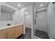 Sleek bathroom with a glass-enclosed shower featuring marble tile and modern fixtures at 1655 N Williams St, Denver, CO 80218
