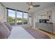 Bright bedroom featuring large windows with outdoor views and stylish furnishings at 1655 N Williams St, Denver, CO 80218
