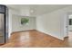 Spacious living room featuring neutral paint, wood floors, and natural light at 495 Quebec St, Denver, CO 80220