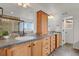 Bright bathroom with a double vanity, framed mirrors, and a glass-enclosed shower at 20826 Robins Dr, Denver, CO 80249