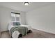 Clean bedroom with a queen size bed, comfy bedding, and a large window at 20826 Robins Dr, Denver, CO 80249