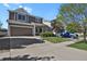 Charming two-story home with a two-car garage and a well-maintained lawn and landscaping at 20826 Robins Dr, Denver, CO 80249