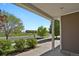 Covered porch with white columns offers scenic neighborhood views and manicured landscaping at 20826 Robins Dr, Denver, CO 80249
