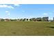 Scenic neighborhood view featuring well-maintained homes, a grassy area, and a sense of community at 20826 Robins Dr, Denver, CO 80249