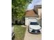 Charming home featuring attached garage, front yard, and quaint walkway at 482 S Kalispell Way # E, Aurora, CO 80017