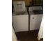 Laundry area with modern washer and dryer units, convenient for chores at 482 S Kalispell Way # E, Aurora, CO 80017