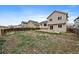 A spacious backyard offers plenty of room for outdoor activities, landscaping, and entertaining at 16175 Peregrine Dr, Parker, CO 80134