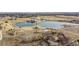 Scenic aerial view of community lakes, green spaces, and recreational area at 3137 E 112Th Pl, Thornton, CO 80233