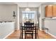 Dining room featuring hardwood floors and patio access through sliding glass doors at 3137 E 112Th Pl, Thornton, CO 80233