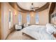 Bright main bedroom featuring sitting area and distinctive rounded architecture at 12555 Critchell Ln, Littleton, CO 80127