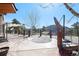 Open patio with decorative features, providing an ideal space for outdoor entertainment and relaxation with a view at 12555 Critchell Ln, Littleton, CO 80127