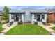Charming bungalow with inviting front porch and well-manicured lawn at 3764 N Raleigh St, Denver, CO 80212