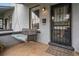 Inviting front porch with a swing, decorative door, and charming details at 3764 N Raleigh St, Denver, CO 80212