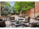 Comfortable patio area with outdoor seating and lounge furniture in the garden at 2400 E Cherry Creek South Dr # 207, Denver, CO 80209