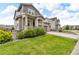 Charming two-story home with landscaped front yard and welcoming covered porch at 4884 St Vrain Rd, Firestone, CO 80504