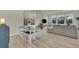 Bright living room area with hardwood floors, large windows, dining table, and a grey sectional at 4884 St Vrain Rd, Firestone, CO 80504