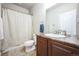 Traditional bathroom featuring a shower-tub combination with a curtain and vanity at 2447 Fairway Wood Cir, Castle Rock, CO 80109