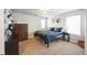 The bedroom features neutral walls, carpeted floors, window, and ceiling light at 2447 Fairway Wood Cir, Castle Rock, CO 80109