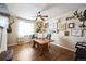 Well-lit home office with a ceiling fan, wood floors, and unique decorative elements at 2447 Fairway Wood Cir, Castle Rock, CO 80109
