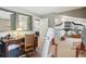 Multi-functional bonus room with desk area and exercise equipment at 1582 W Briarwood Ave, Littleton, CO 80120