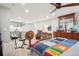 Open-concept living area with kitchen, sleeping area, and plenty of room to enjoy at 1582 W Briarwood Ave, Littleton, CO 80120