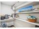 Spacious walk-in pantry with extensive shelving for organized food storage, perfect for home at 1582 W Briarwood Ave, Littleton, CO 80120