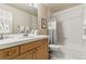 Bathroom features a bath, vanity, and mirror and a neutral color scheme at 168 S Garfield St, Denver, CO 80209