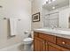 Bright bathroom featuring a vanity with marble countertop and a shower with white tiled walls at 168 S Garfield St, Denver, CO 80209