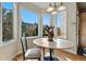 A view of the eating nook, with windows providing plenty of natural light at 168 S Garfield St, Denver, CO 80209