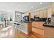 Well-equipped kitchen with wood cabinets, a center island, and a breakfast nook, great for casual dining at 168 S Garfield St, Denver, CO 80209