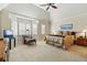 Large main bedroom features bay window, plush carpet, sitting area, and vaulted ceilings at 168 S Garfield St, Denver, CO 80209