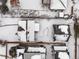 Aerial view of houses and yards covered in snow at 2615 N Steele St, Denver, CO 80205