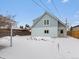 Newly constructed studio above garage in snowy backyard at 2615 N Steele St, Denver, CO 80205